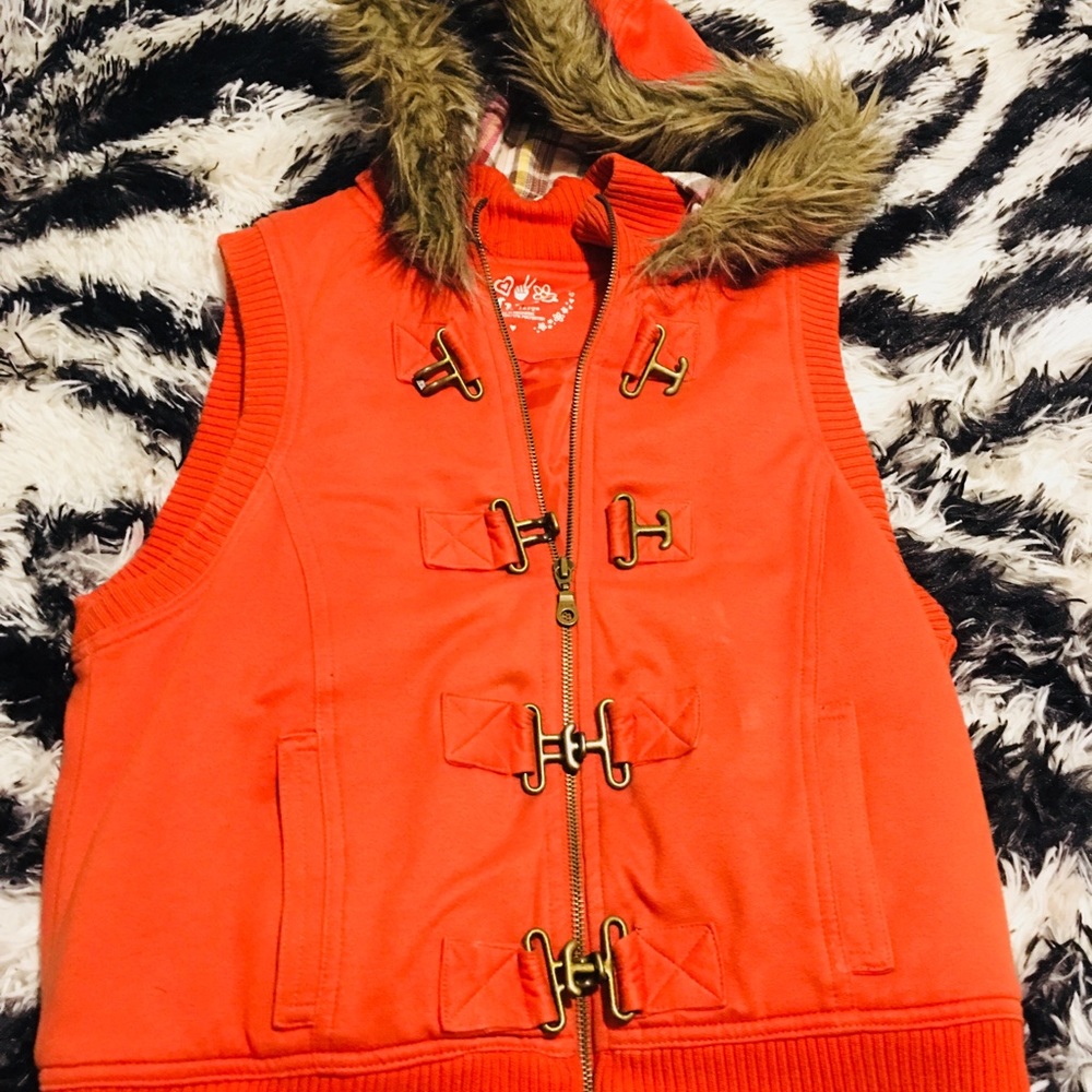 Vest with fur hood